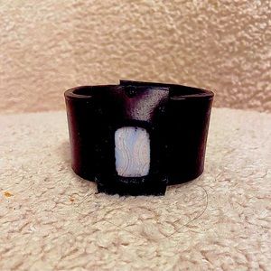 Handmade brown leather cuff with natural blue agate stone.